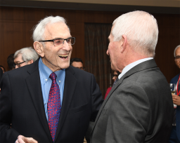 Dr. Fauci stands with Dr. Nachman during a dinner reception.