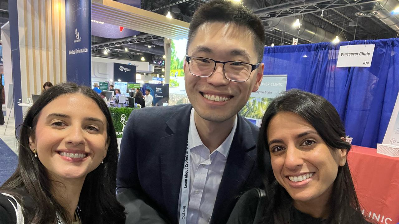 three students at convention
