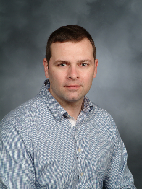 Travis E. Hartman