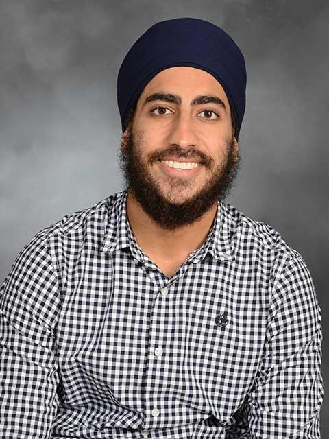 Dr. Manjinder Kandola